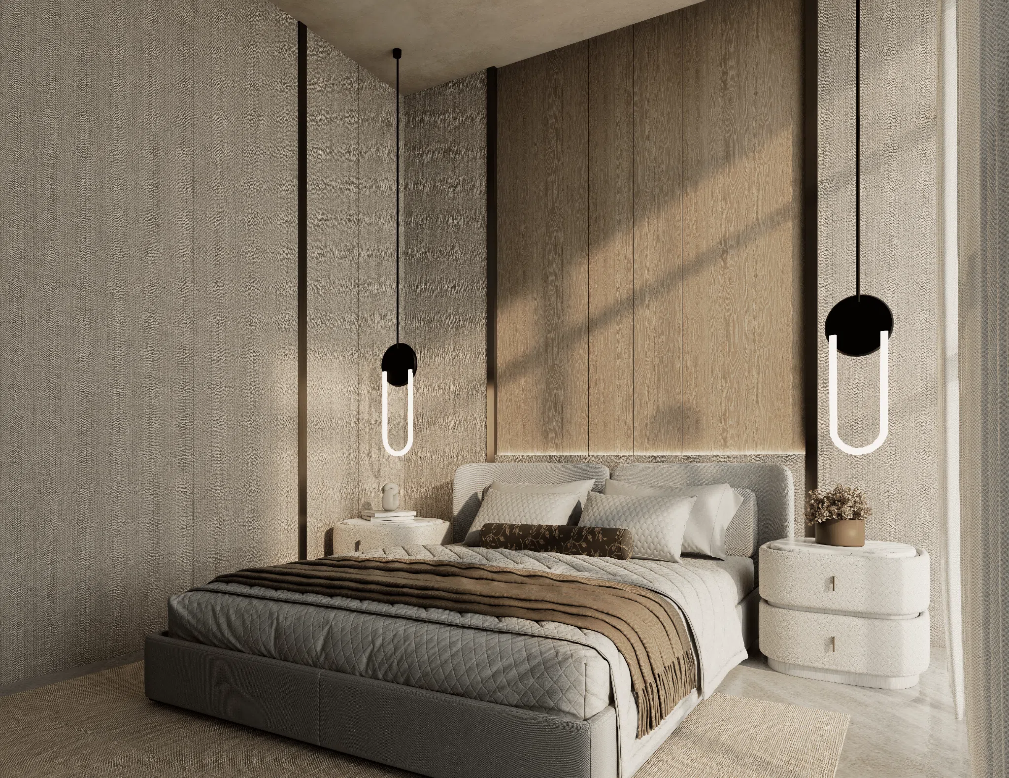 Principal bedroom with upholstered wall panels and warm daylight