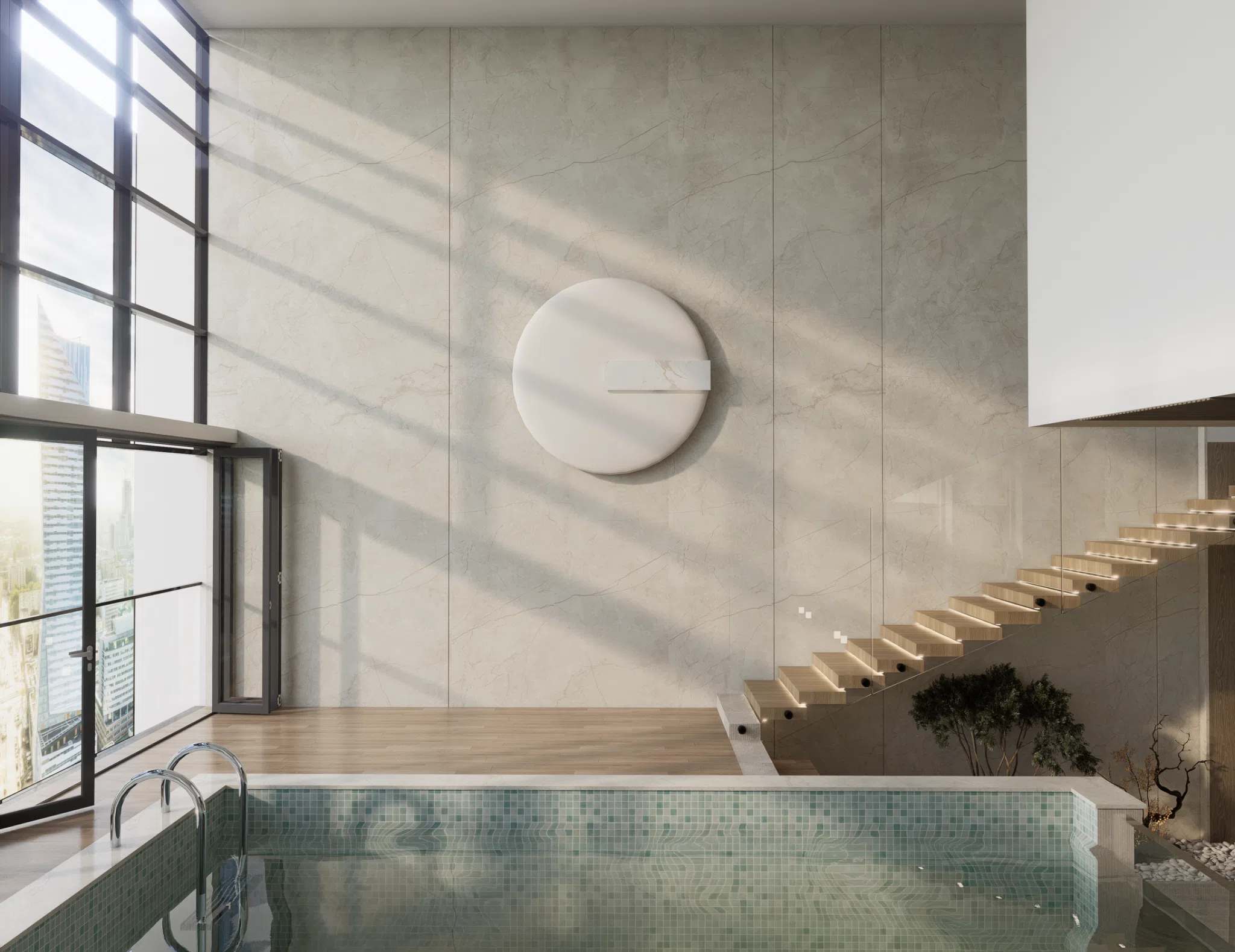 Indoor pool beside an illuminated floating staircase
